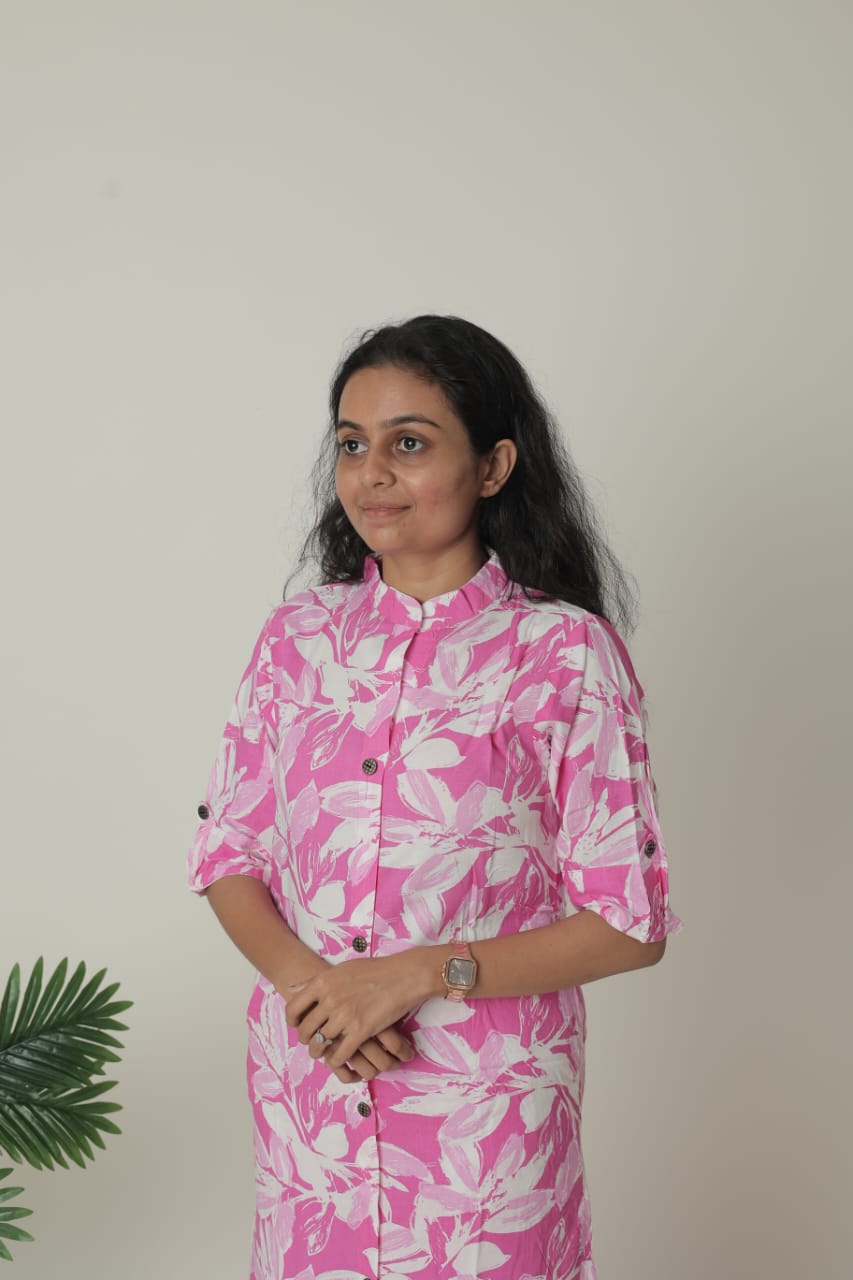 Portrait of a Woman in a Pink Floral Outfit